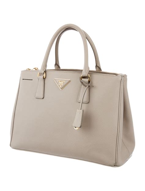 prada galleria double zip tote saffiano with accessories medium pomice|prada saffiano bag.